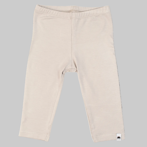 Beige baby leggings with a brand logo on a white background